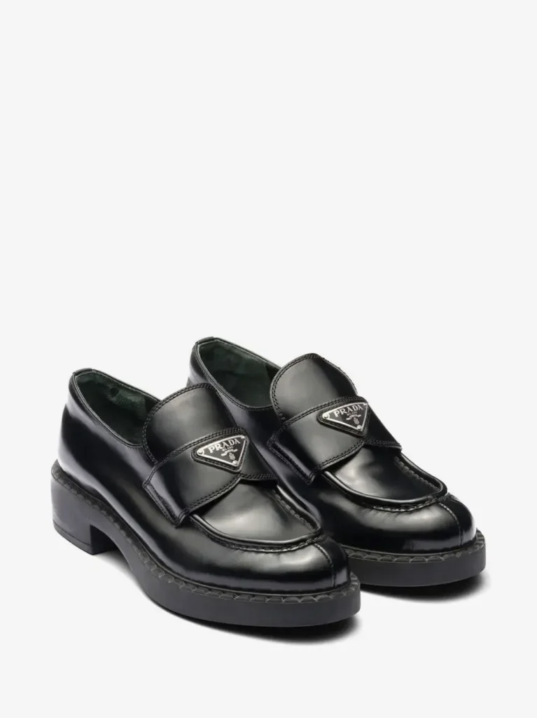 Black leather loafers with a chunky sole for a quiet luxury capsule wardrobe
