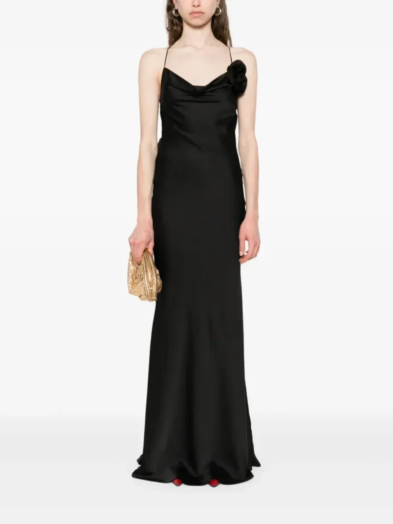 Long black dress with a minimalist silhouette for an elegant capsule wardrobe