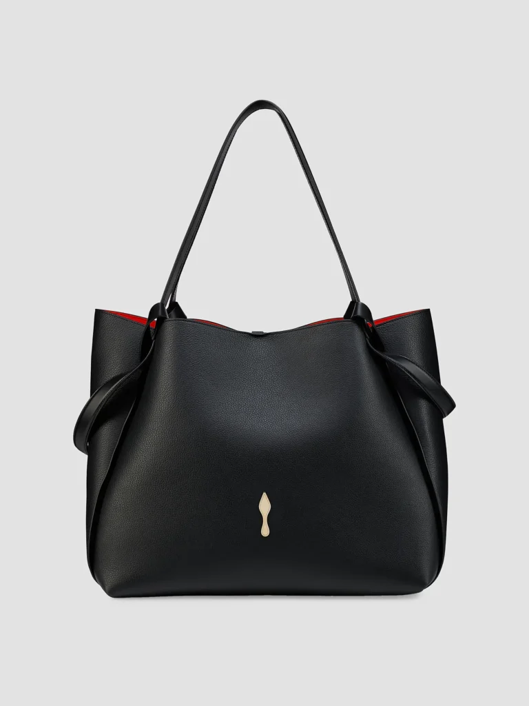 Structured black leather tote bag with minimalist gold hardware